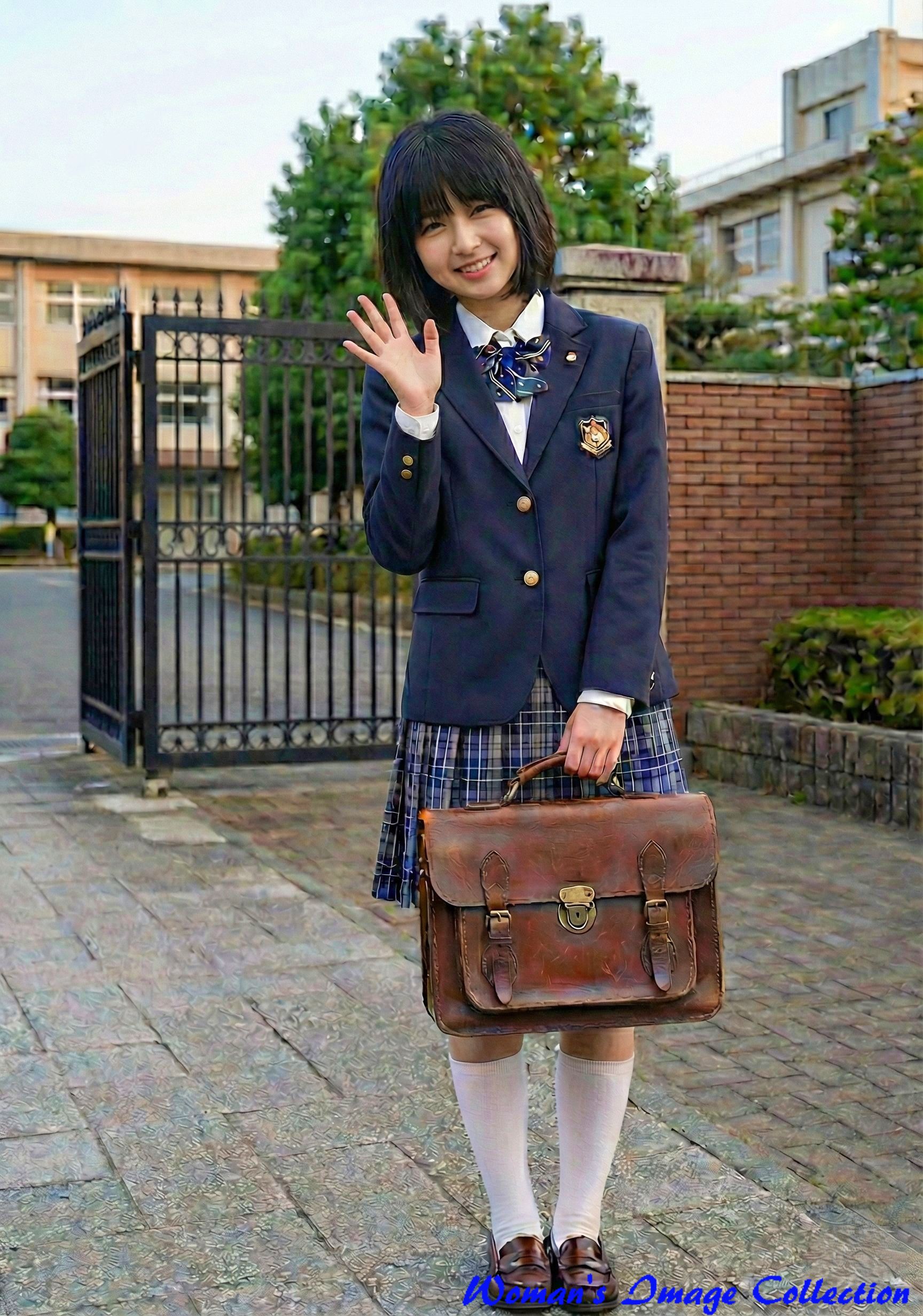 校門前で小さく手を振る女子高生